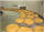 Fresh hot glazed donuts in production!